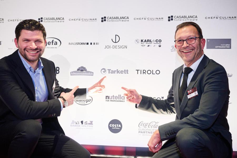 Logopräsenz von Tarkett auf der Pressewand